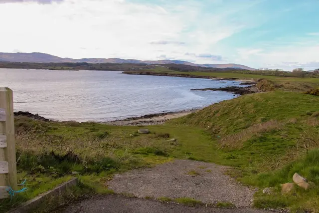 a path leading to a body of water