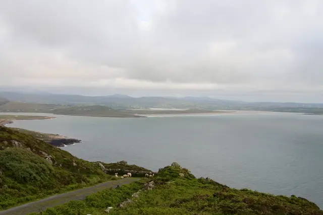 a body of water with land around it