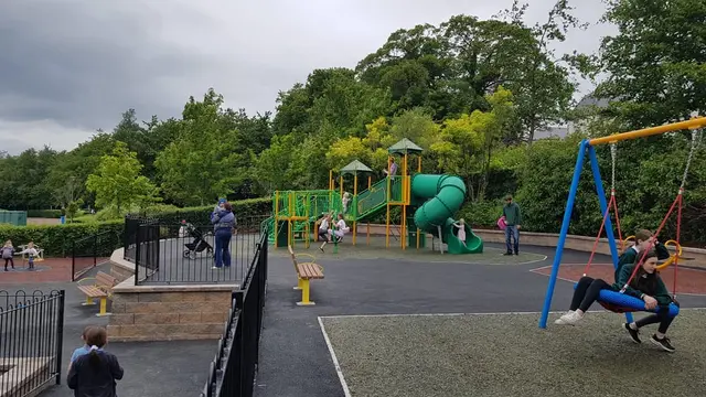 a group of people playing on a playground