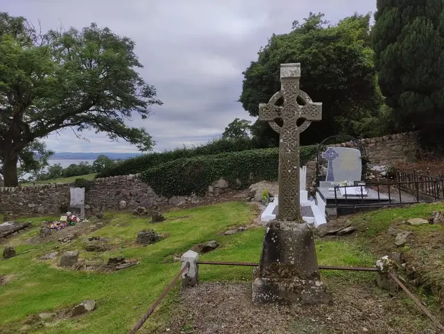 a cross in a graveyard